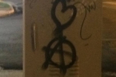 Peace, Love, Anarchy tag